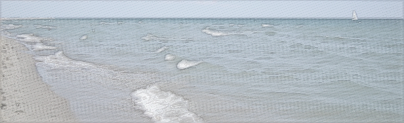 Auslaufwellen am Strand.